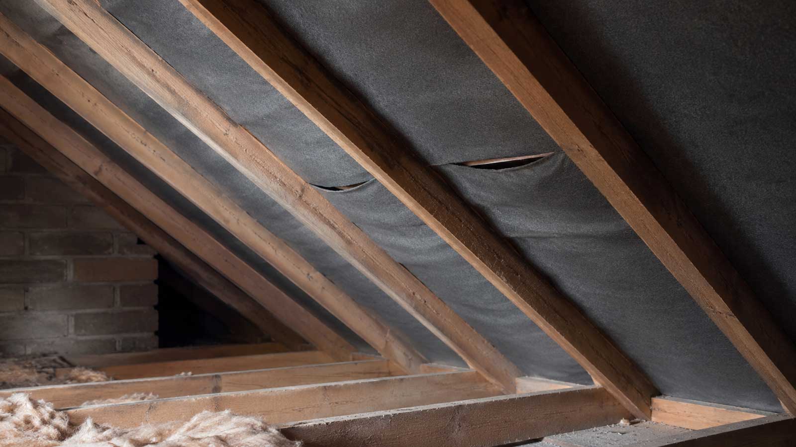 Roofing detail relevant to damaged roofing felt under tiles in stockport